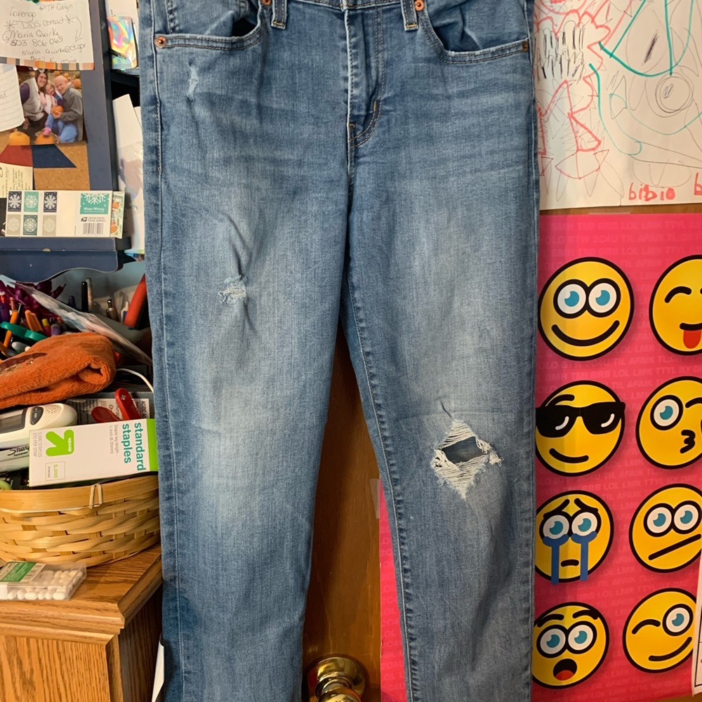 Woman’s mBlue Distressed Jeans